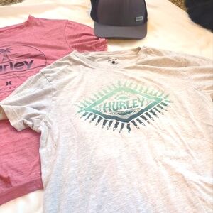 Two small Hurley t shirts hat included